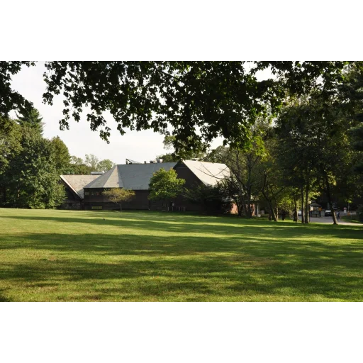Pine Manor College logo